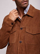 Blusão em pele castanho escuro